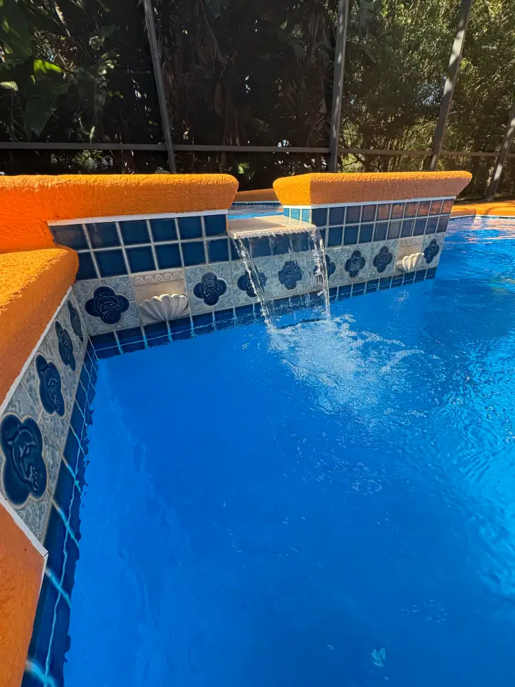 Pool water feature cleaned and maintained by Firewater Pools